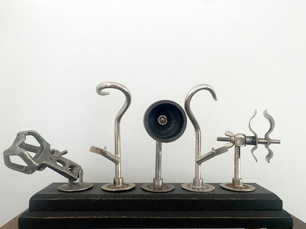 A Selection Of Prosthetic Arm Attachments Mounted On A Wooden Base c.1930’s - Source Vintage