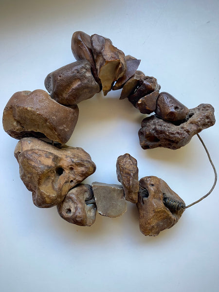 Curious Collection Of Antique Hag Stones Used In Folklore To Ward Off Evil Spirits, Witches & The “Evil Eye”