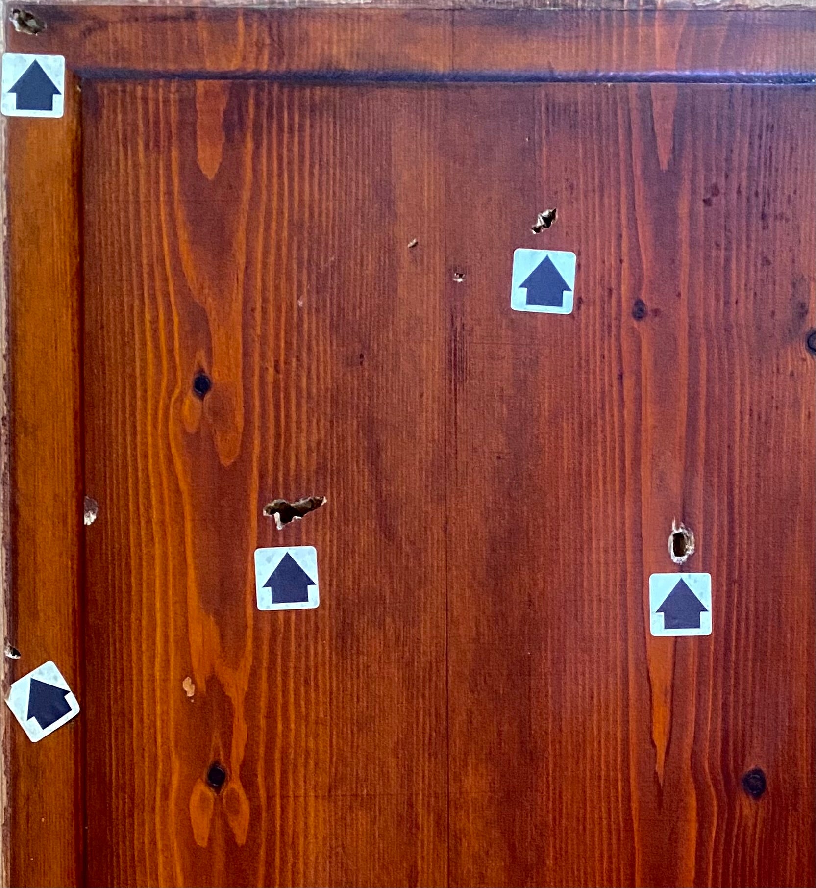 A Door Panel With Bullet Holes & Police Forensic Evidence Markers Recovered From A Crime Scene