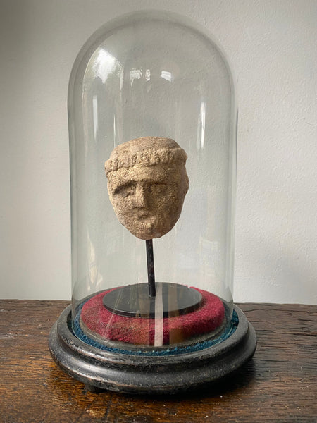 A Curious Antique Carved Stone Monk’s Head On Modern Stand Housed Within A 19th Century Glass Display Dome