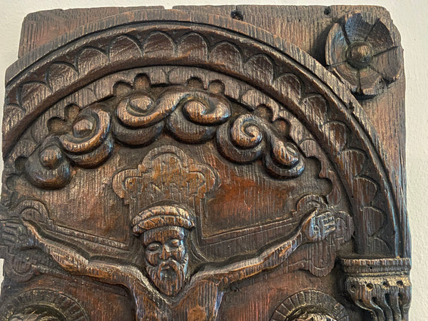 A Superb 16th-17th Century Carved Oak Panel Depicting The Crucifixion Of Christ