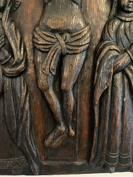 A Superb 16th-17th Century Carved Oak Panel Depicting The Crucifixion Of Christ