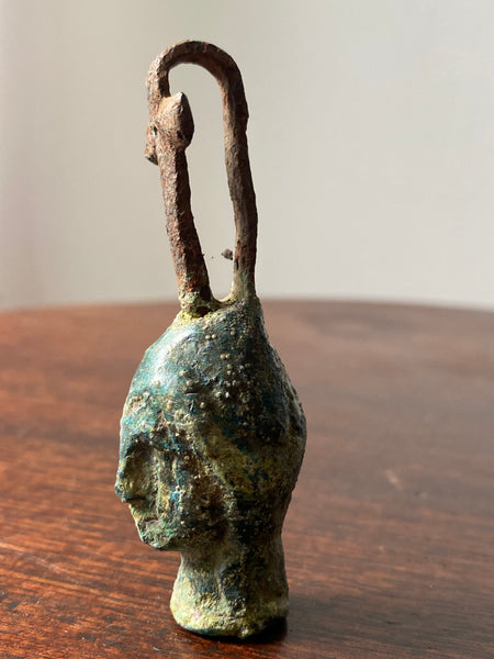 Rare Ancient Roman Bronze Head Of A Religious Figure With An Iron Loop In The Form Of A Cross c.200 AD