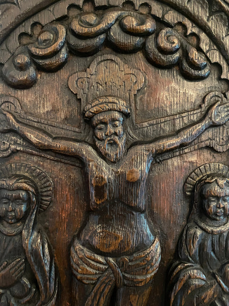 A Superb 16th-17th Century Carved Oak Panel Depicting The Crucifixion Of Christ