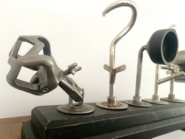A Selection Of Prosthetic Arm Attachments Mounted On A Wooden Base c.1930’s - Source Vintage